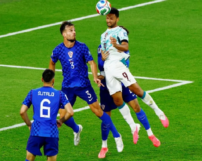 ramos-sends-portugal-into-last-16-as-var-drama-caps-wild-finish-against-croatia-CSegziy5.webp